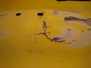 Scheur in bult onder Quest